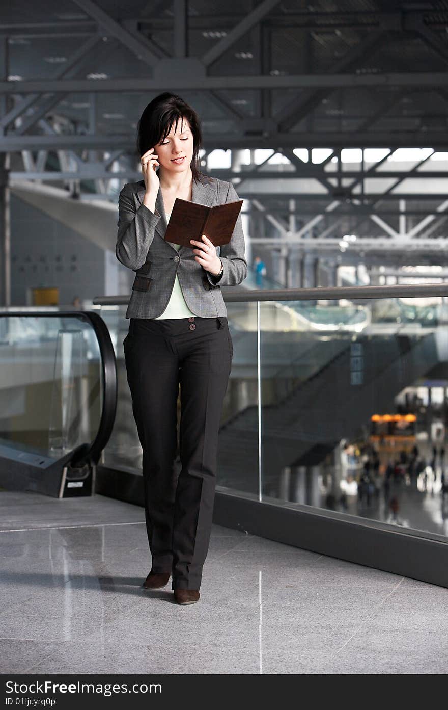 Young confident caucasian businesswoman in the working space. Young confident caucasian businesswoman in the working space