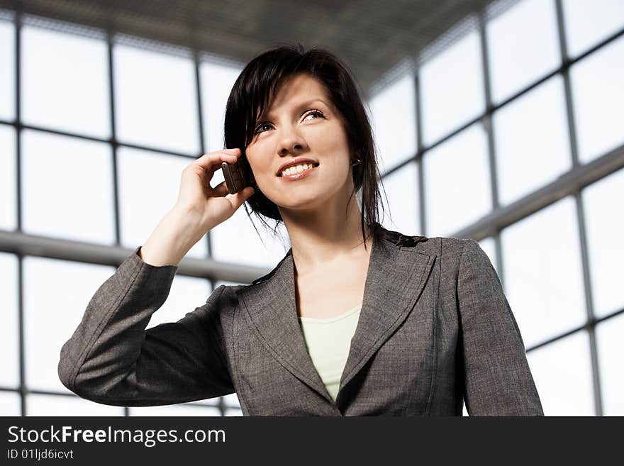 Young confident caucasian businesswoman in the working space. Young confident caucasian businesswoman in the working space