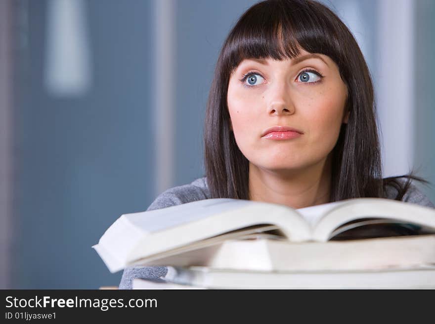 Young woman studying in a modern classroom