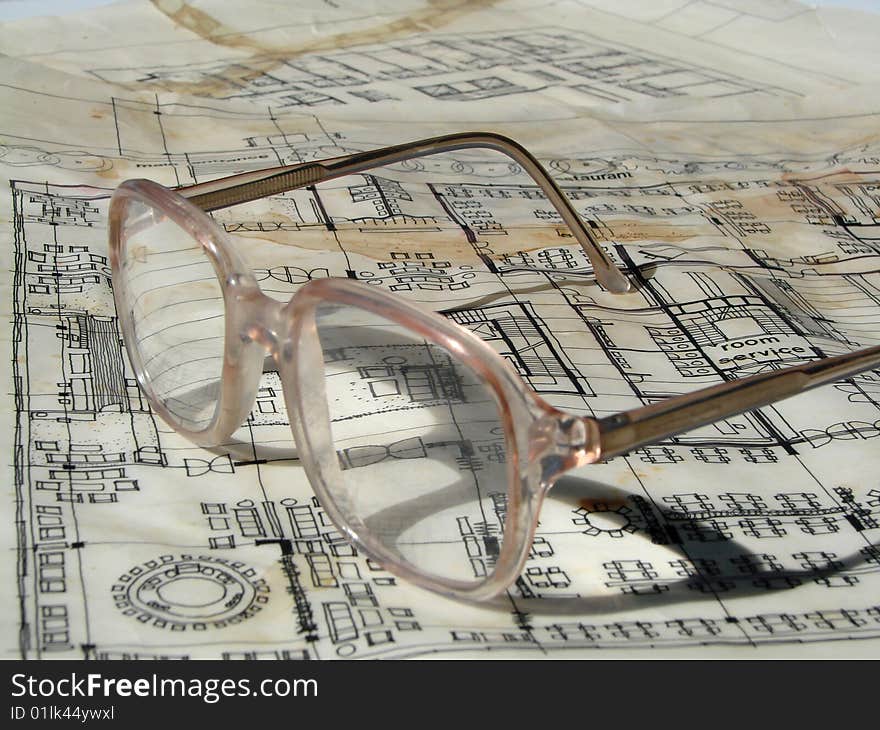 Blueprints and glasses