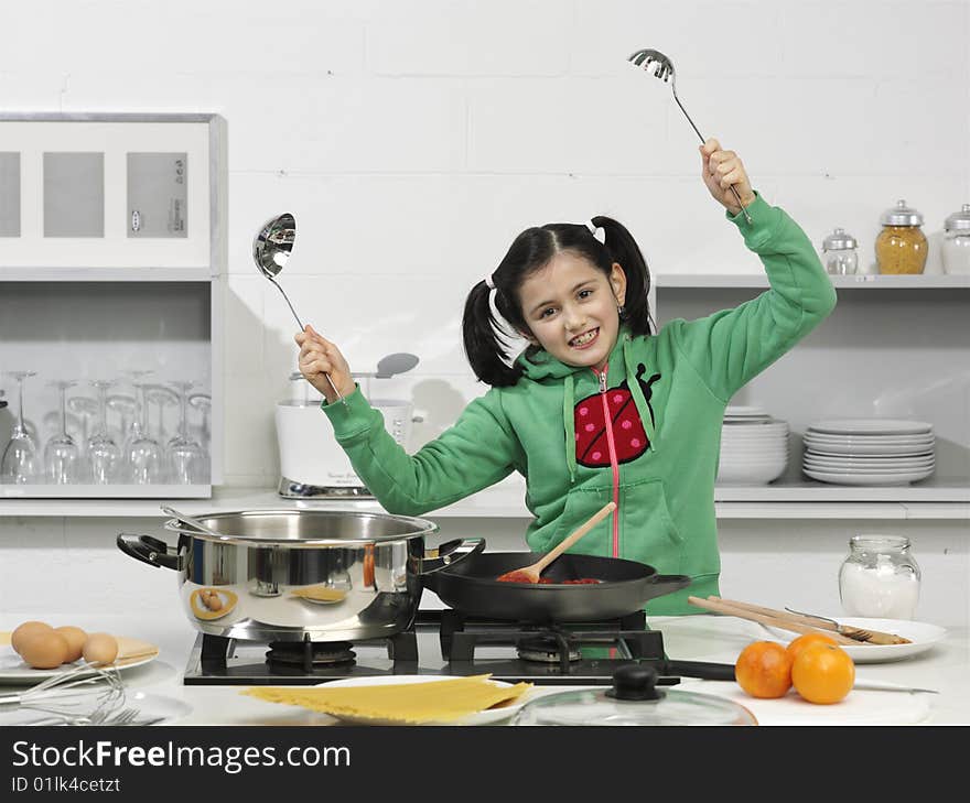 Little girl in the kitchen