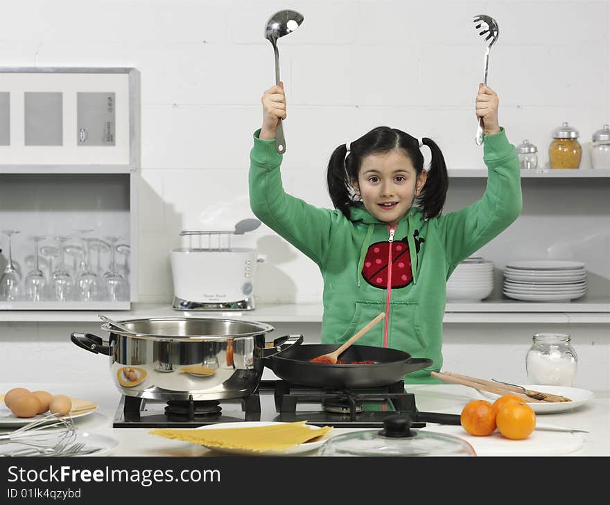 Little girl in the kitchen