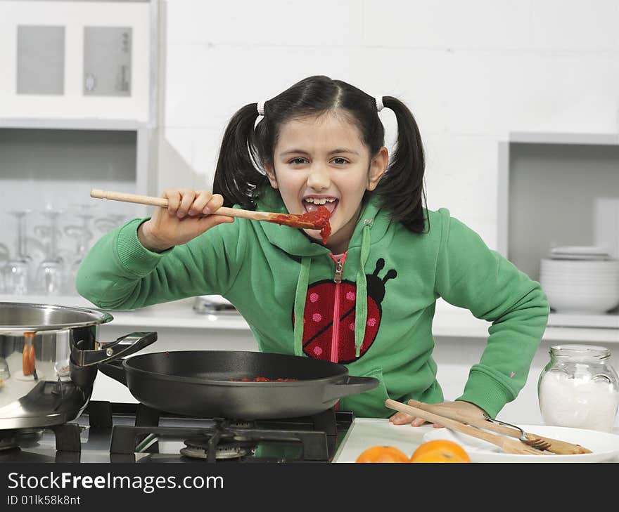 Little girl in the kitchen