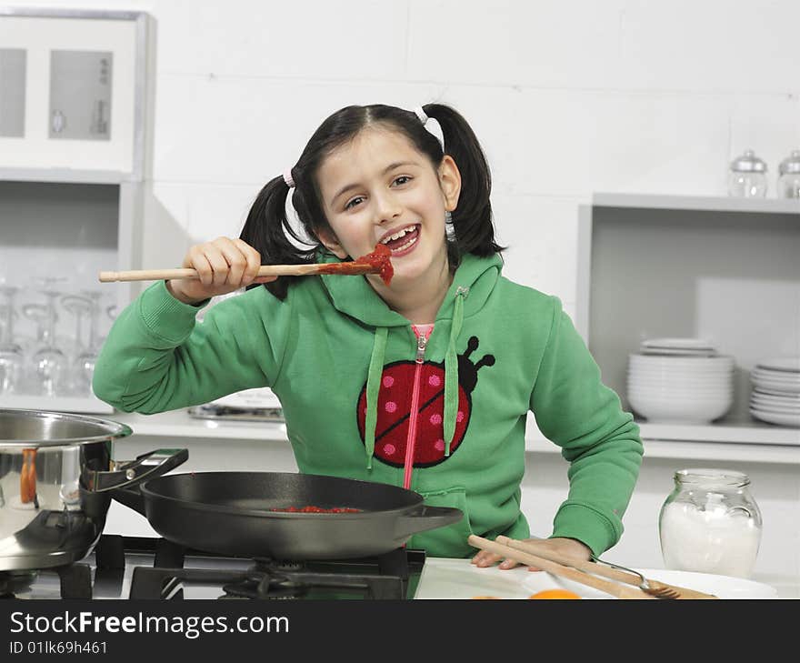 Little girl in the kitchen