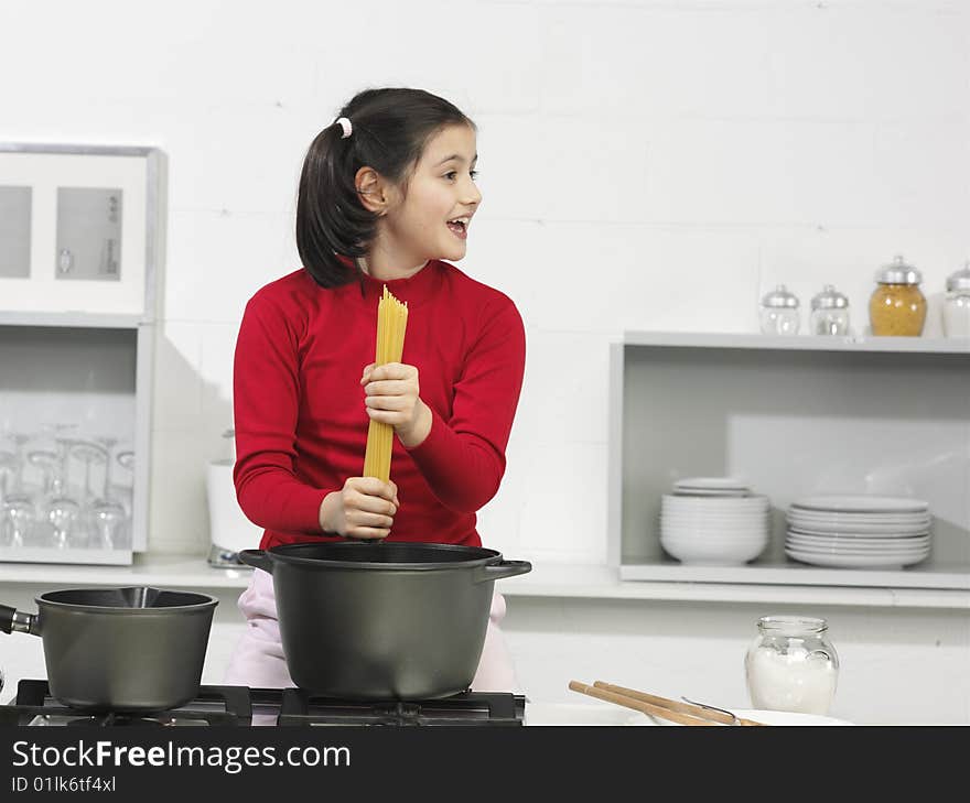 Little girl in the kitchen