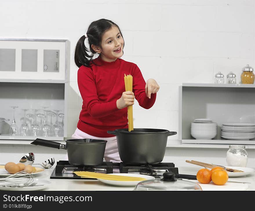 Little girl in the kitchen