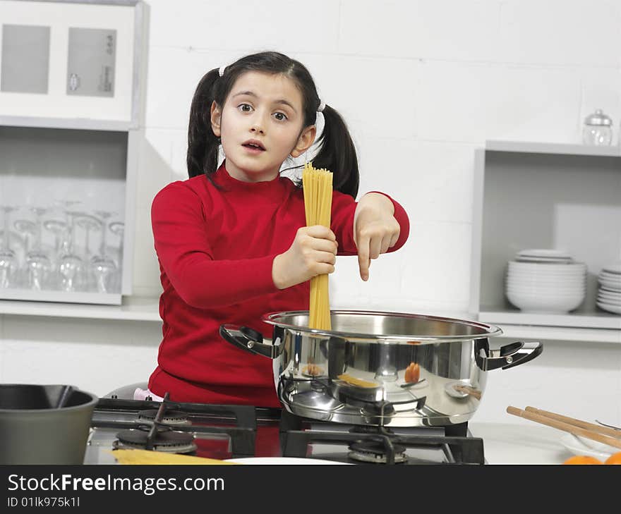 Little girl in the kitchen