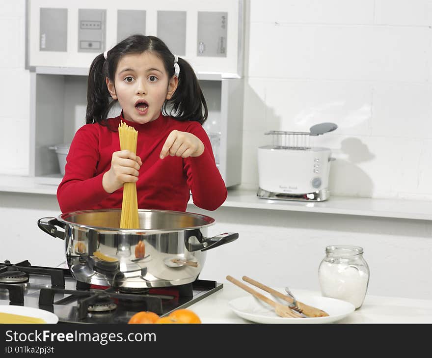 Little girl in the kitchen