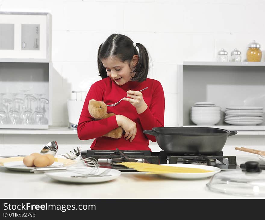 Little girl in the kitchen