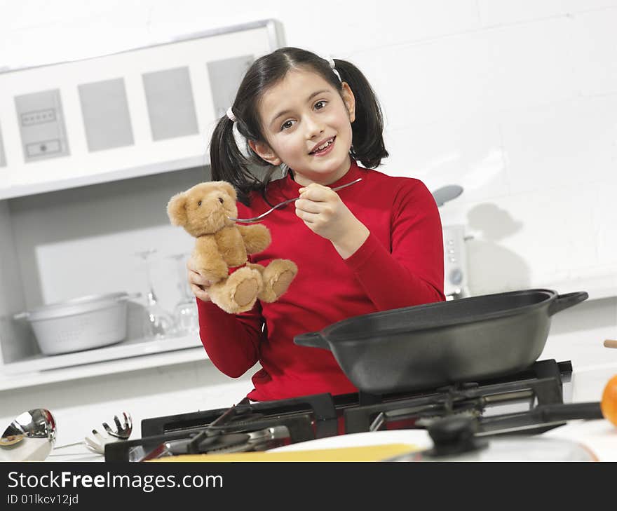 Little girl in the kitchen