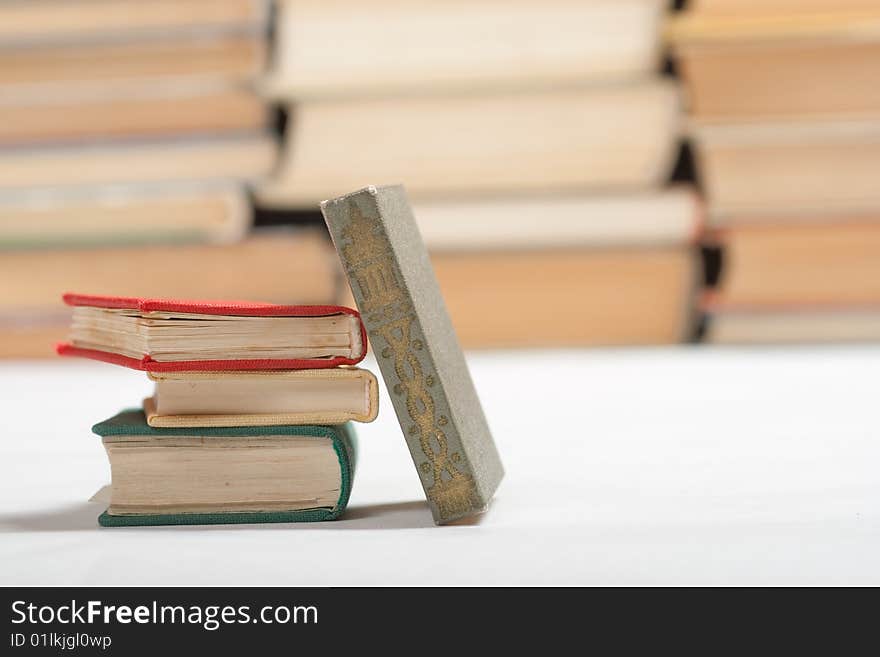 Small books on white background