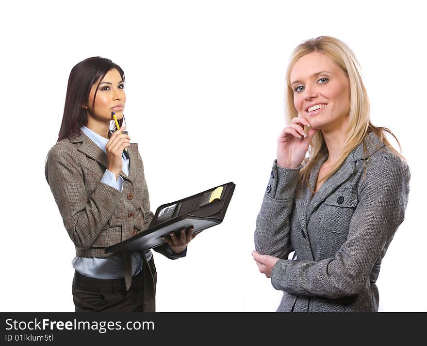 Female business team isolated on white in the studio