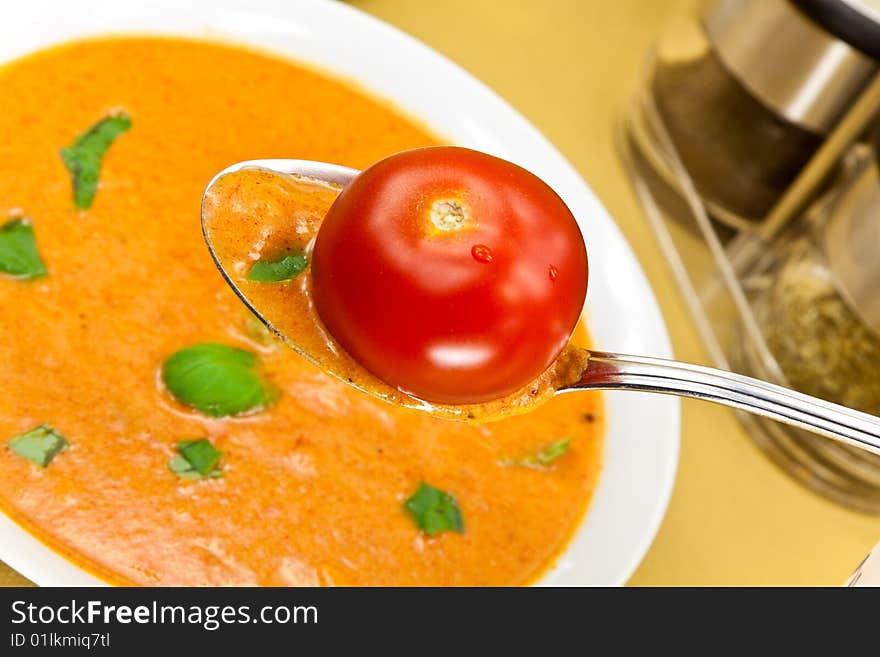 Soup from beet and tomato with sour cream, view from above. Soup from beet and tomato with sour cream, view from above.