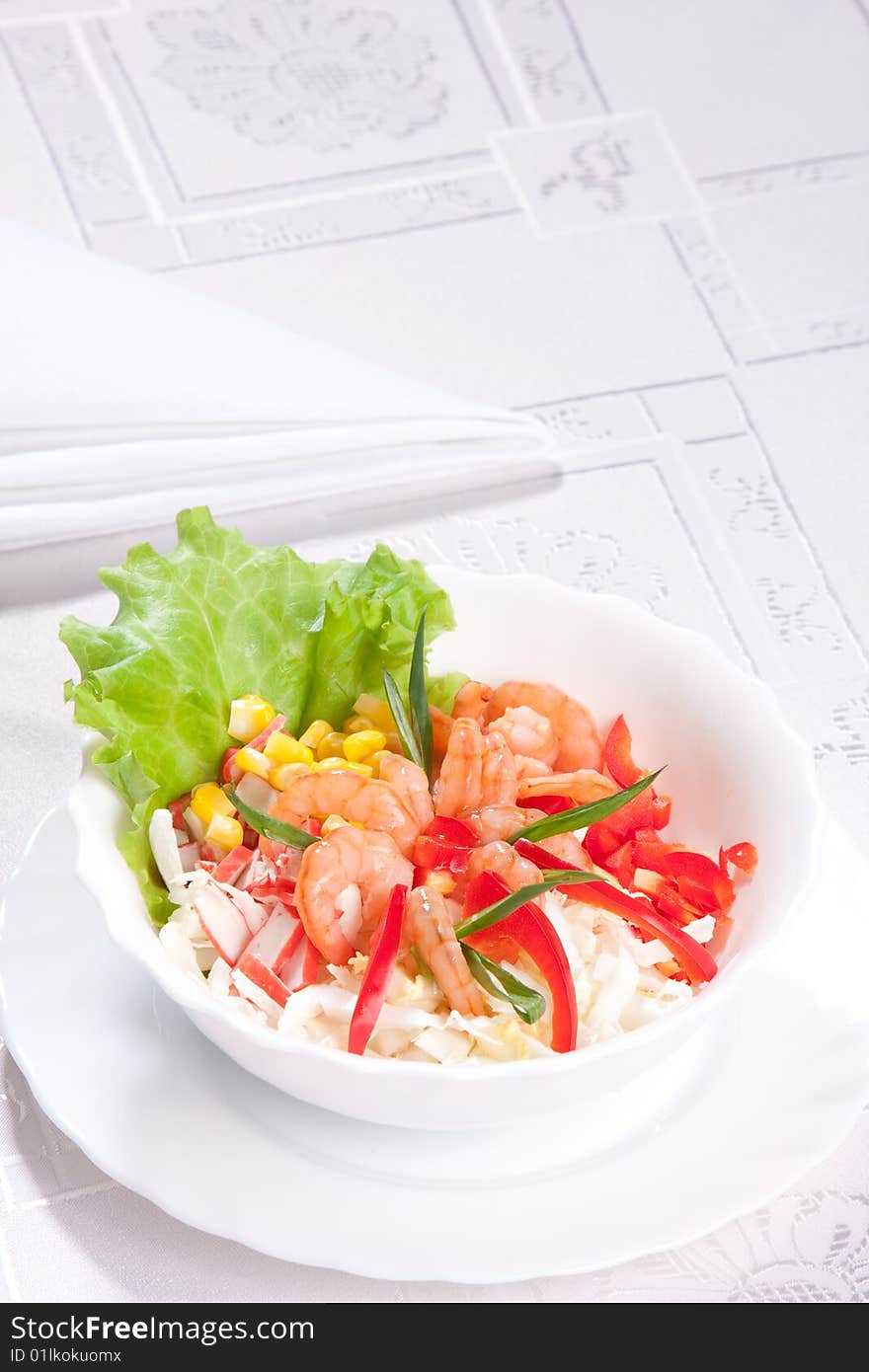 Delicious salad with prawns and corn