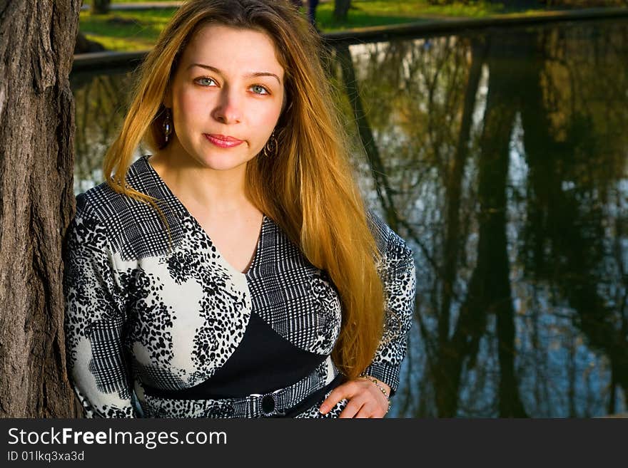 Beautiful elegant woman outdoors