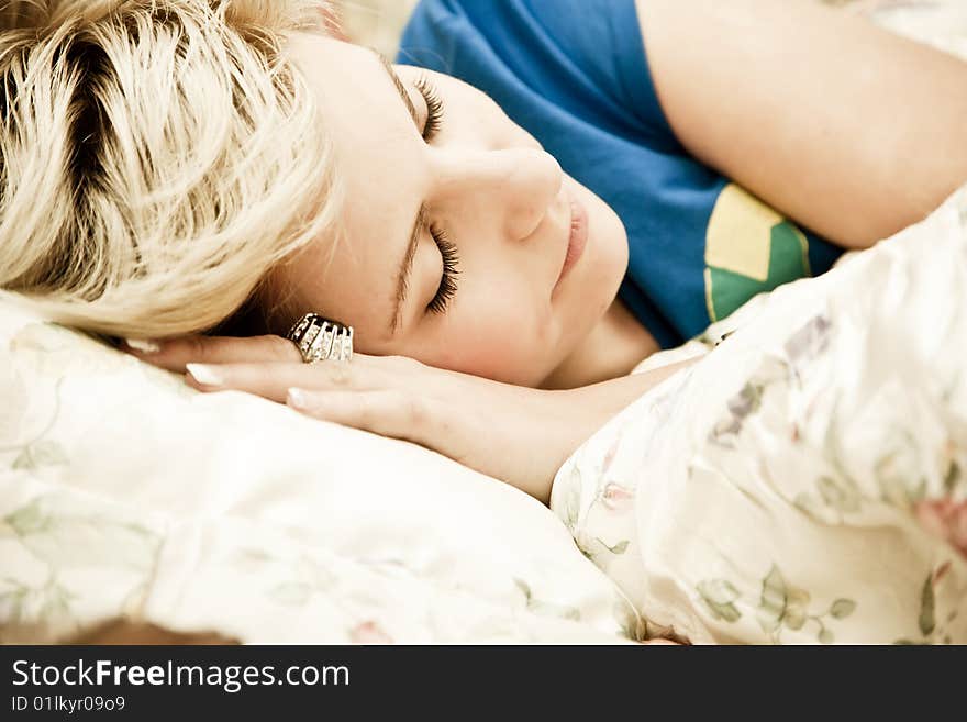 Young woman portrait still in bed. Young woman portrait still in bed.