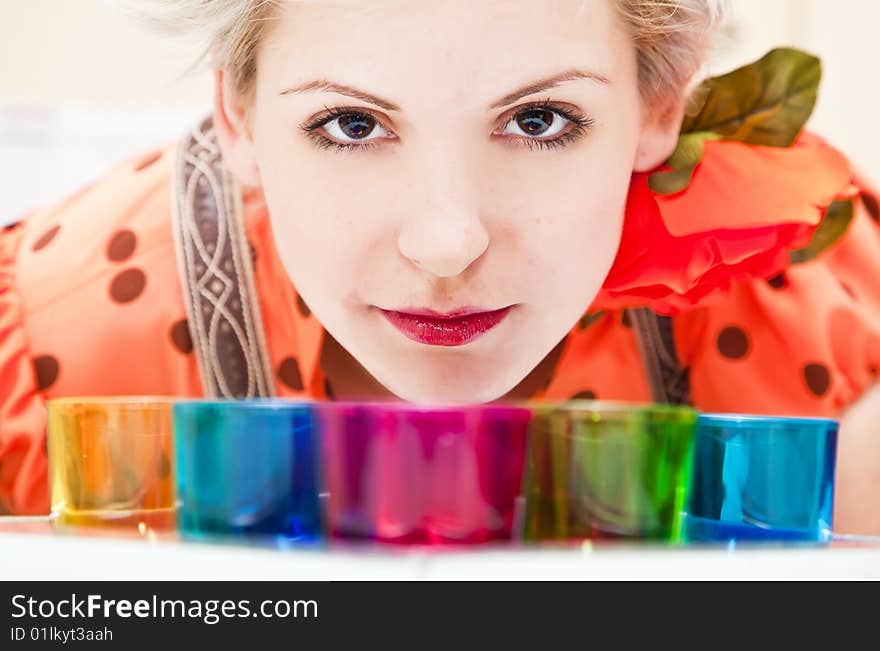 Young blond woman portrait, staring at camera.