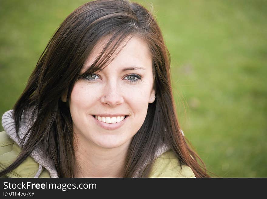 Beautiful woman in jacket smiling. Beautiful woman in jacket smiling