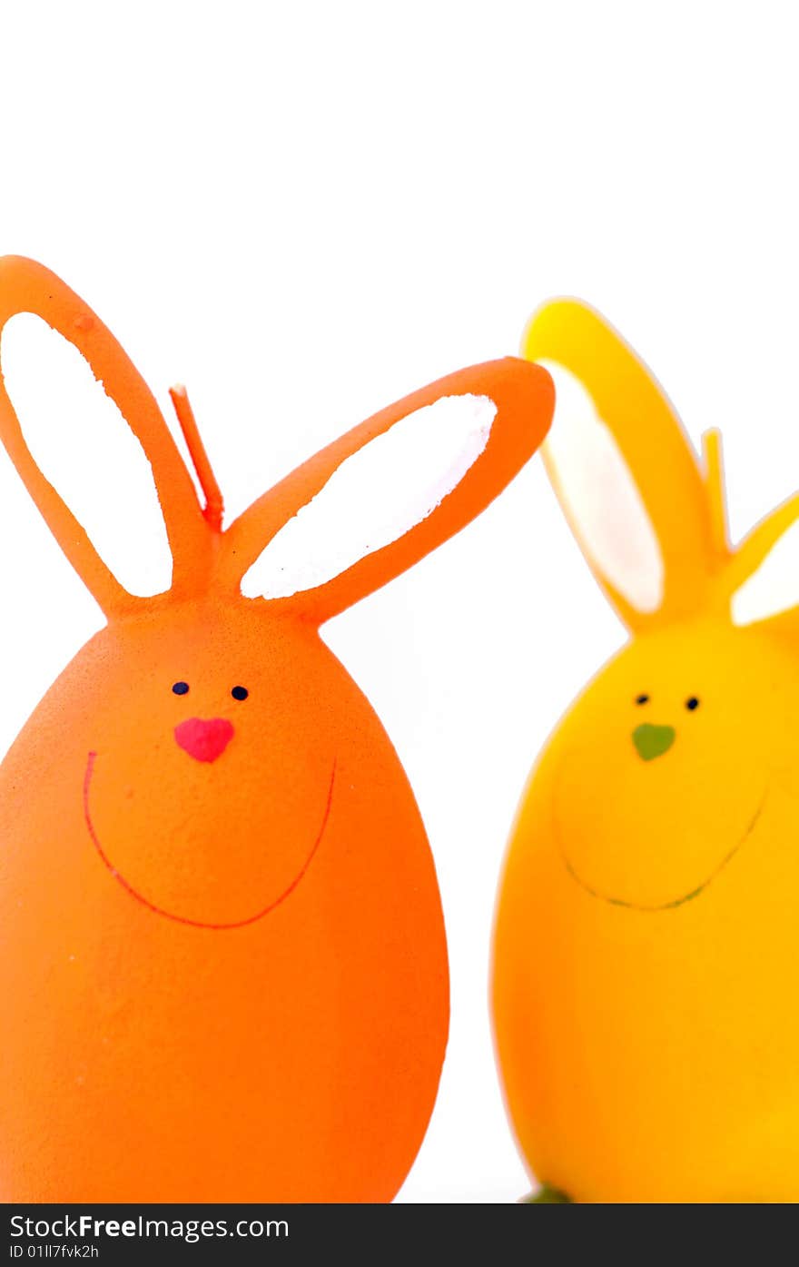 Two easter's rabbits ,orange and yellow