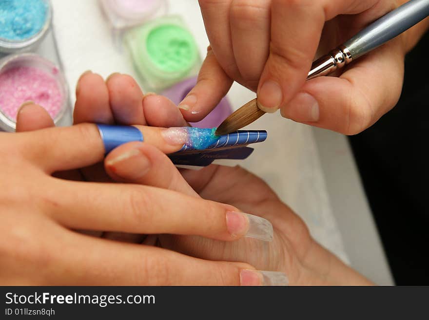 Manicure procedure in beauty center. Manicure procedure in beauty center