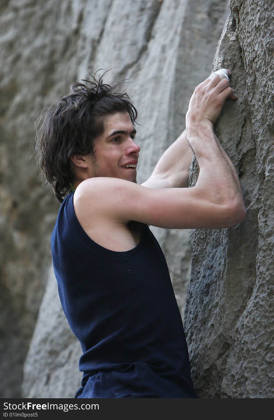 Climber in action on limestone rock