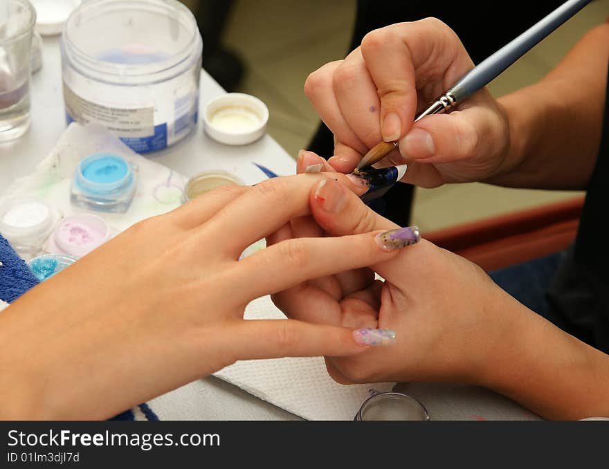 Manicure procedure in beauty center. Manicure procedure in beauty center