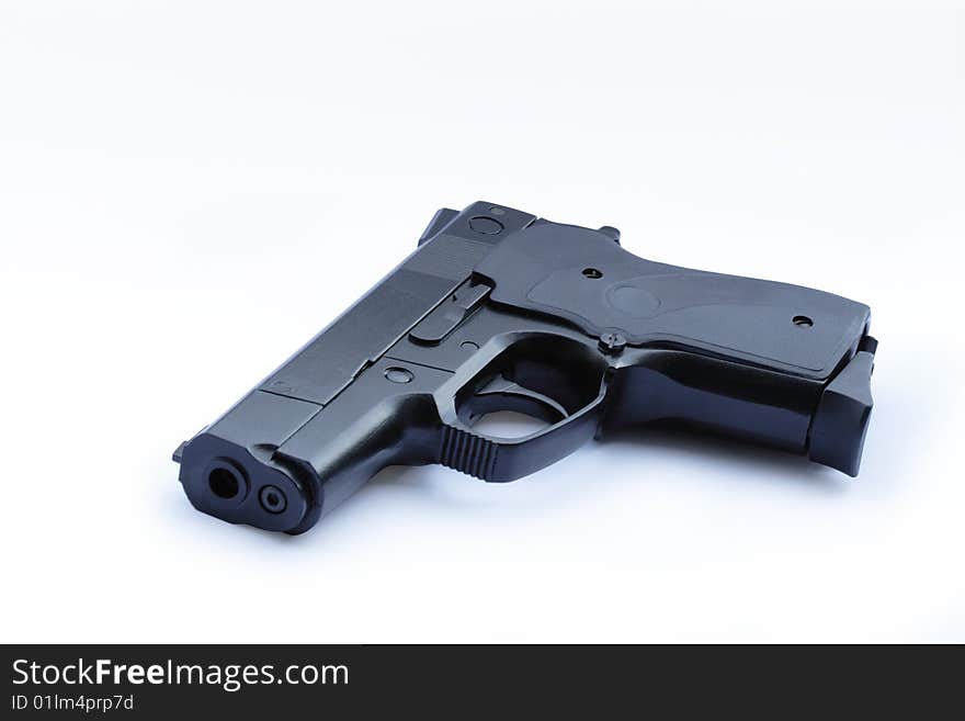 Black modern automatic pistol isolated on white with clipping path. Black modern automatic pistol isolated on white with clipping path