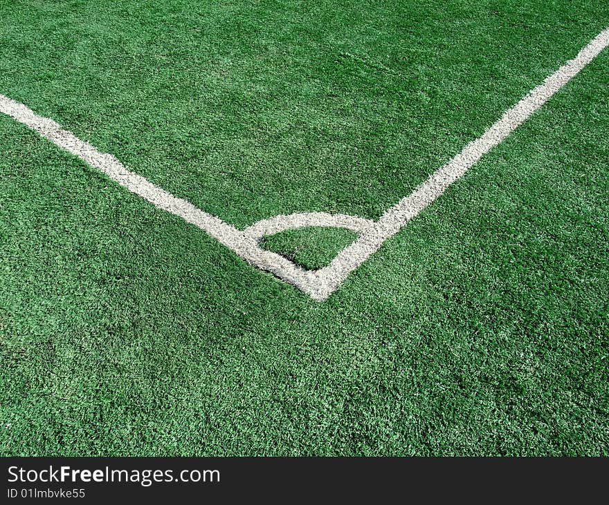 Corner on football/soccer pitch with green artificial grass. Corner on football/soccer pitch with green artificial grass