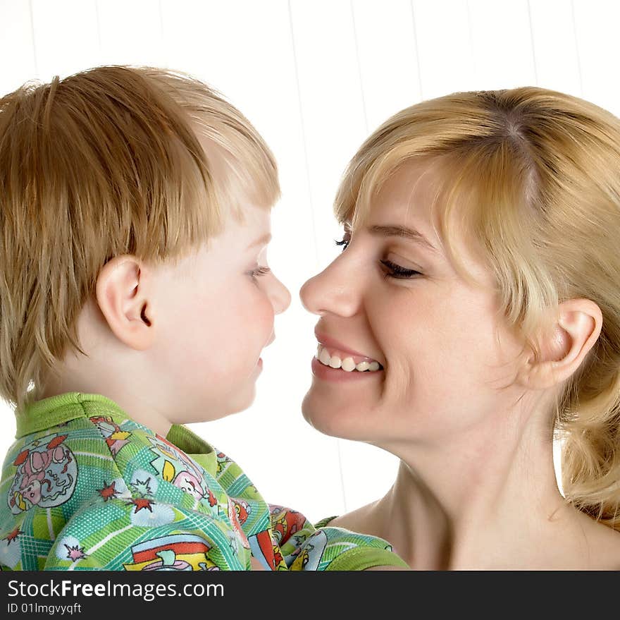 The little boy with mum on the isolated. The little boy with mum on the isolated