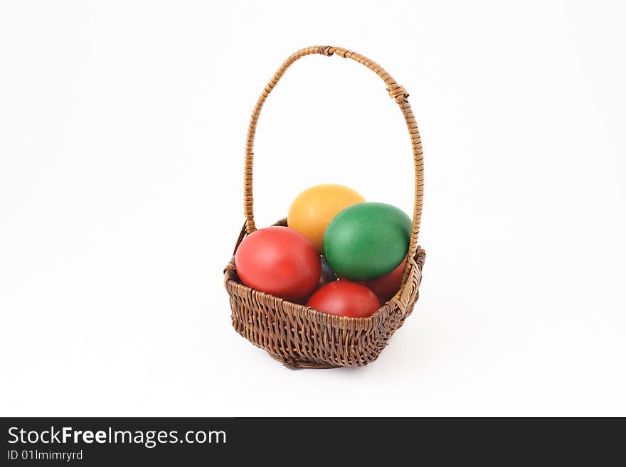 Basket with Easter egg on white