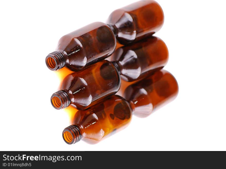 Brown vials for storage of medical preparations and chemical reactants.