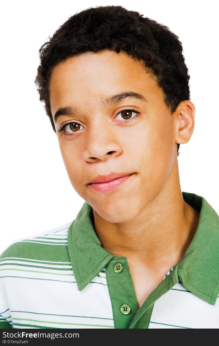 Teenage boy smiling isolated over white