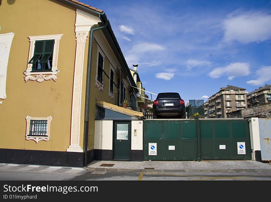 Elevated parking, the car is out of the windows at first floor. Elevated parking, the car is out of the windows at first floor