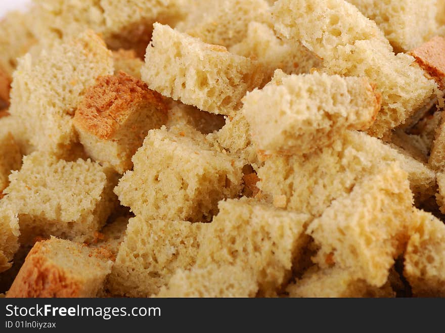 Grain crackers from a white loaf cut with cubes also are roasted.