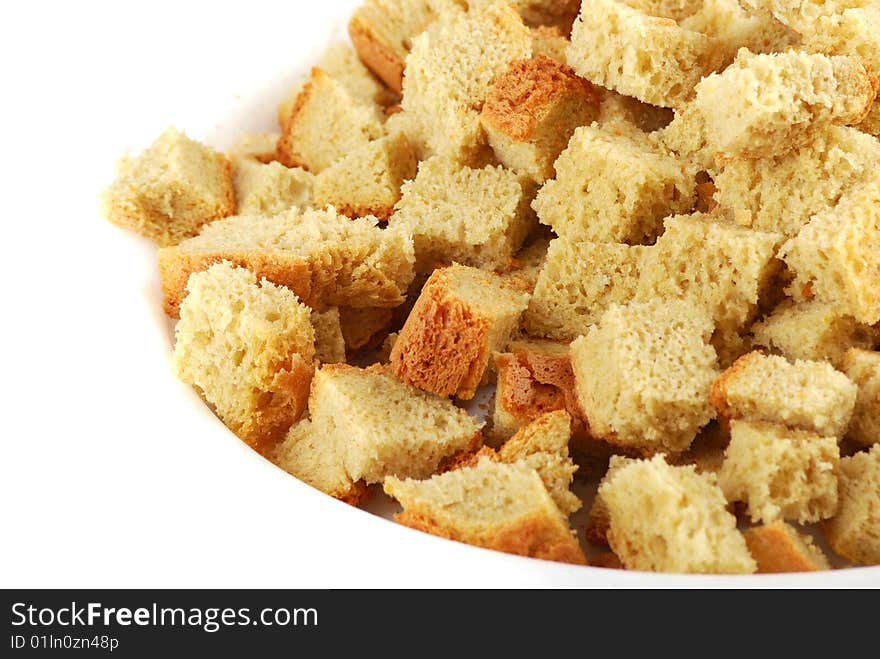 Grain crackers from a white loaf cut with cubes also are roasted.