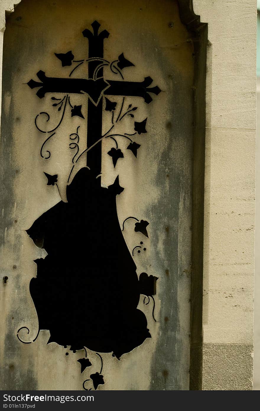 Ruined door of chapelle in french cemetery. Ruined door of chapelle in french cemetery