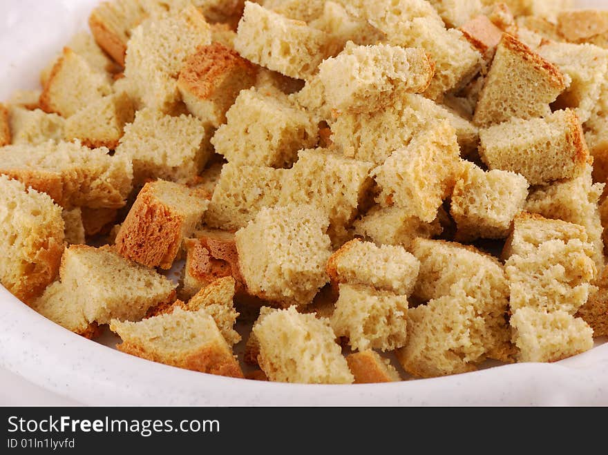 Grain crackers from a white loaf cut with cubes also are roasted.