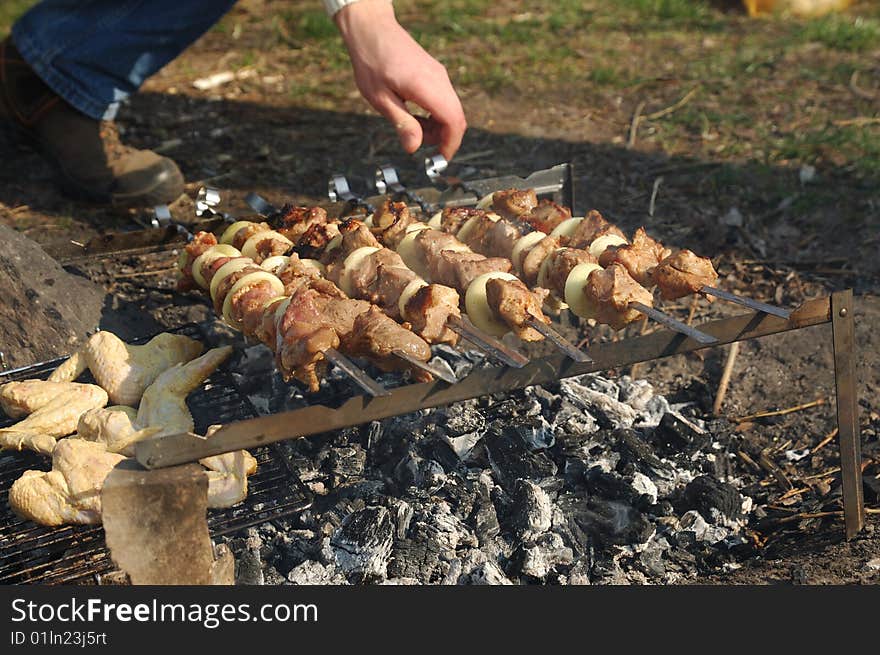 Grilled meat cooking on a coal. Grilled meat cooking on a coal