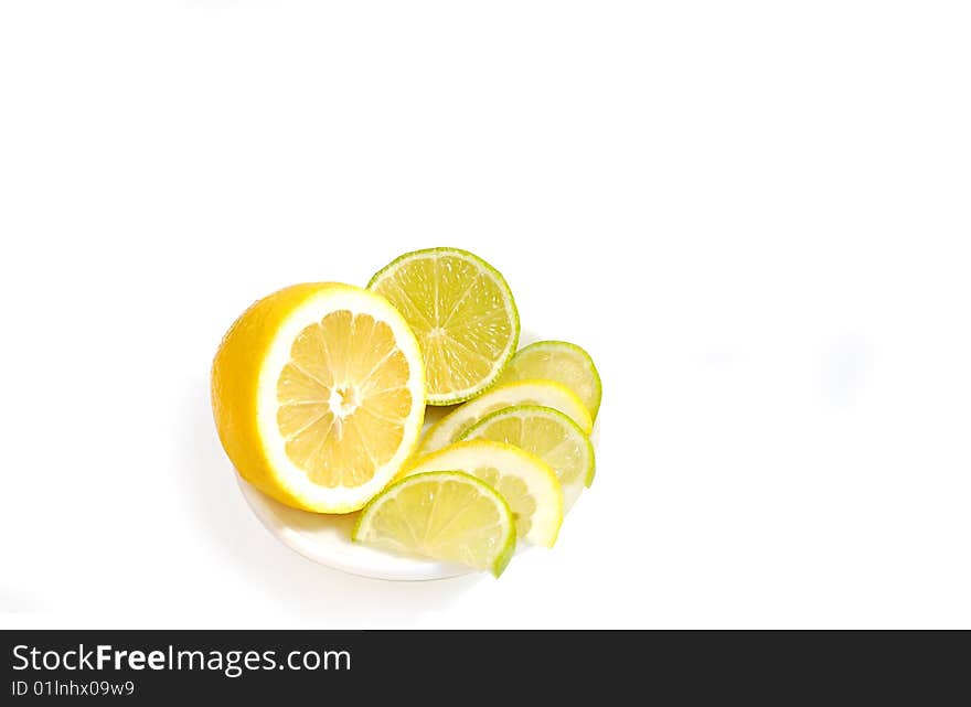 Lemon and lime isolated over white.