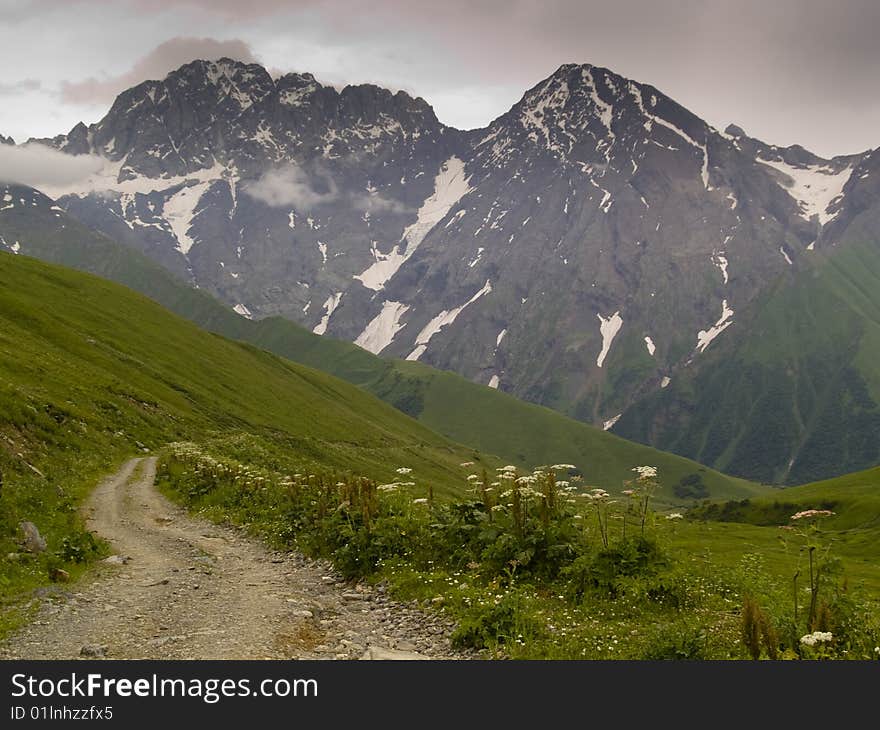 Dark clouds small mountain path to ushguli. Swanetia Georgia. Dark clouds small mountain path to ushguli. Swanetia Georgia.