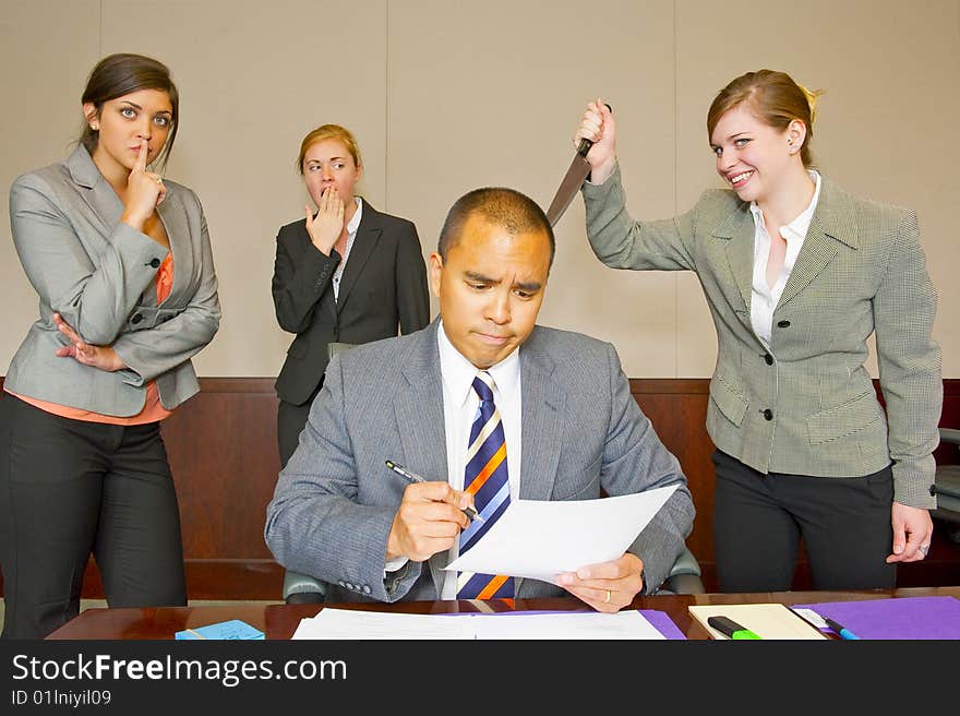 Team member stabbing the manager in the back