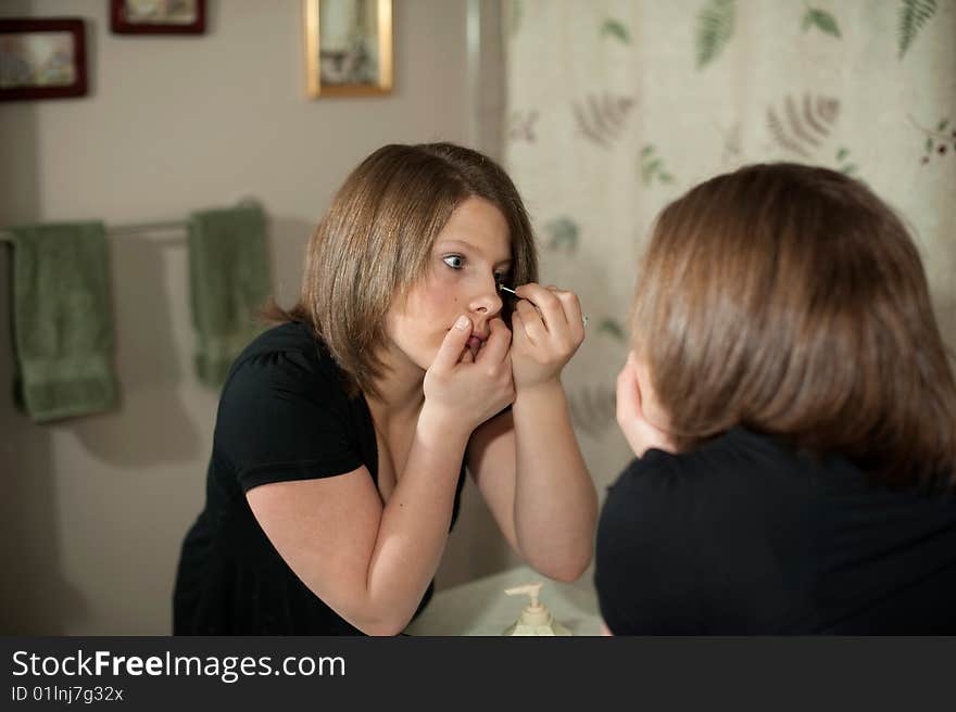 Putting on makeup