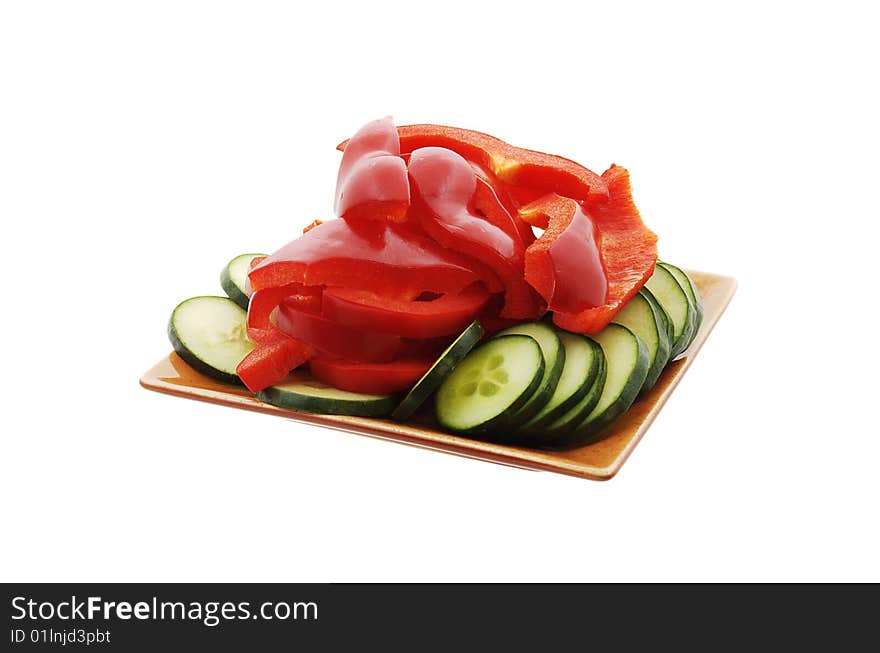 Cut pepper and cucumber on the plate