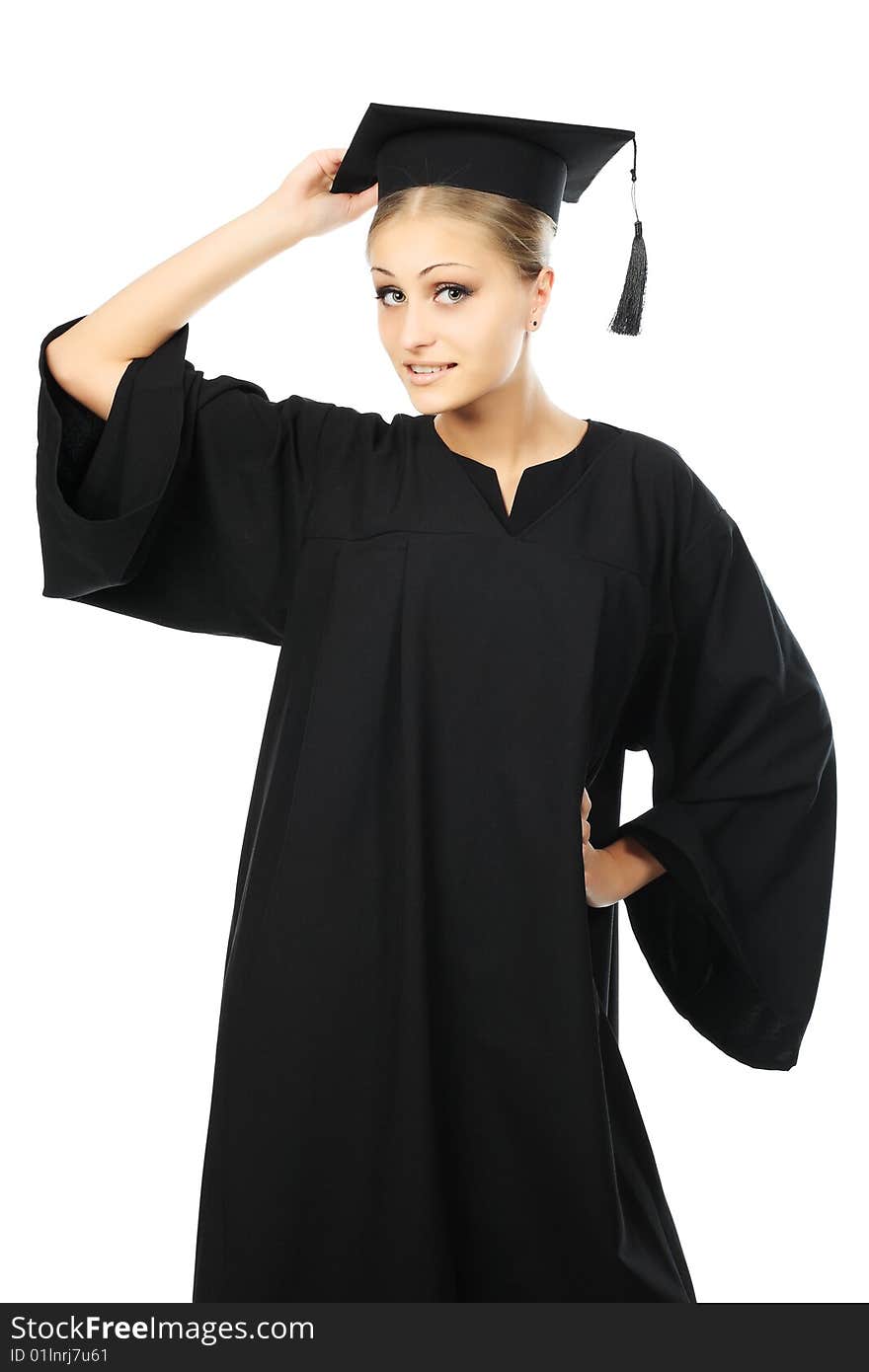 Portrait of a young woman in an academic gown. Educational theme. Portrait of a young woman in an academic gown. Educational theme.