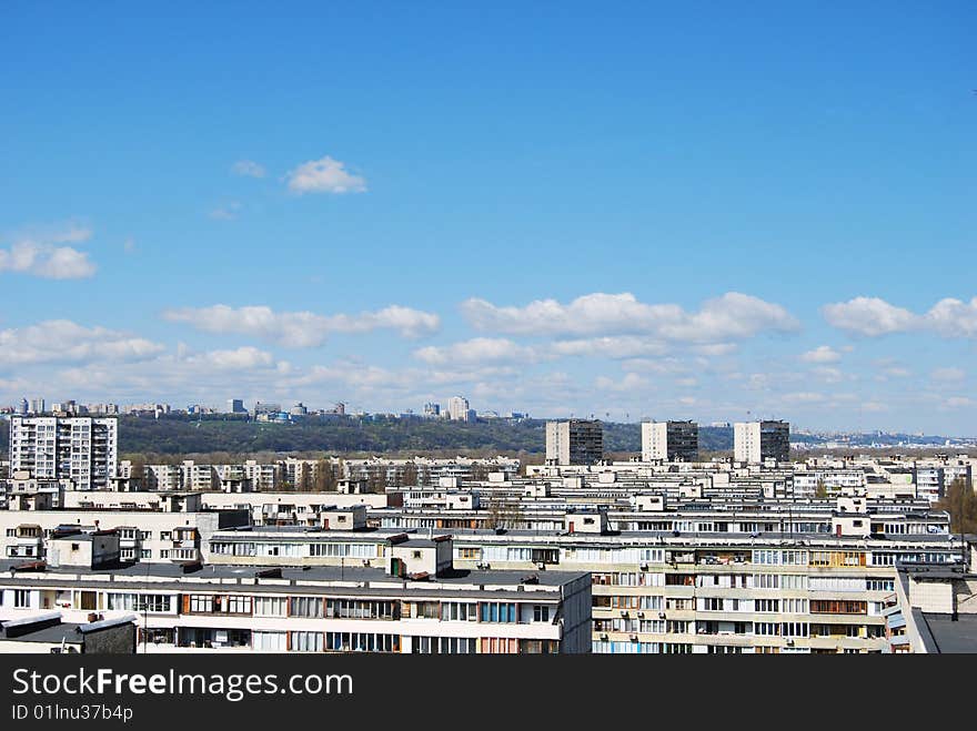 Thousand of roofs against cloud sky background. Thousand of roofs against cloud sky background