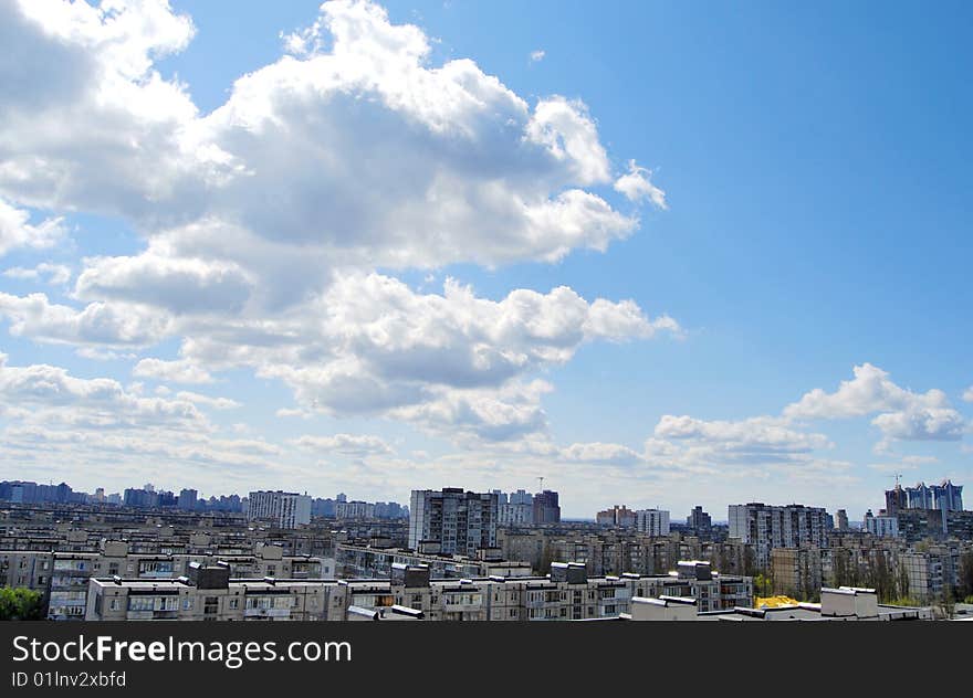 Thousand of roofs against cloud sky background. Thousand of roofs against cloud sky background