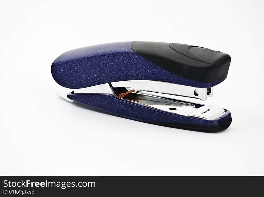 Blue office stapler, isolated over white