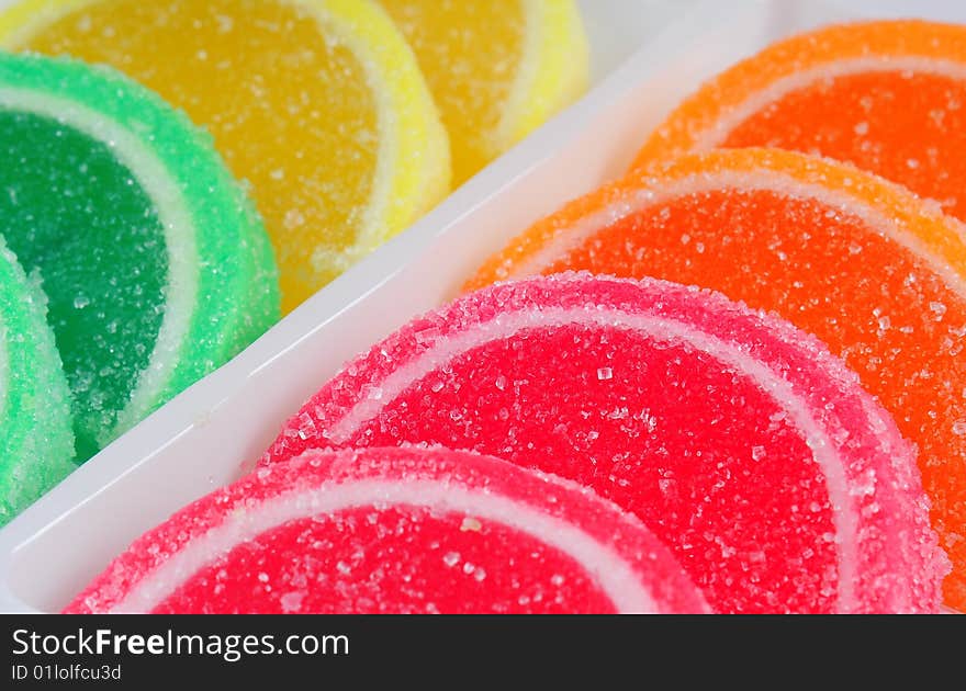 Colorful fruit jelly sweets closeup. Colorful fruit jelly sweets closeup