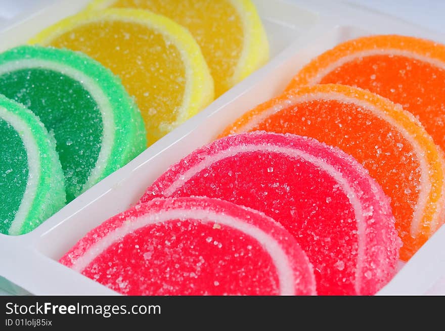 Colorful fruit jelly sweets closeup. Colorful fruit jelly sweets closeup