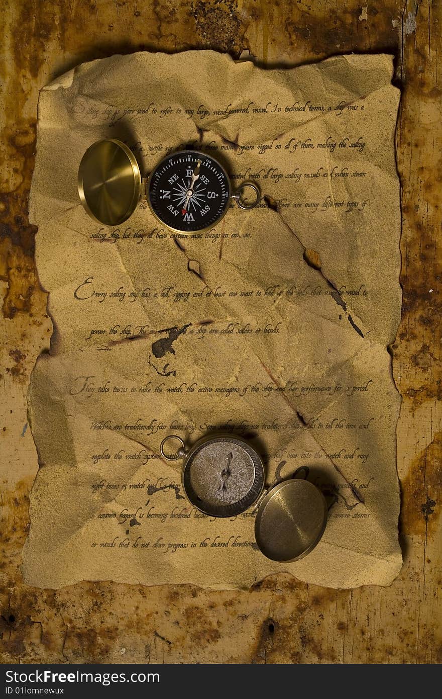 A beautiful old compass on an old letter